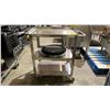 Image 1 : STAINLESS STEEL ROLLING CART WITH STACK OF ROUND PLASTIC TRAYS