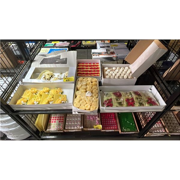 SHELF OF ASSORTED EDIBLE FLOWER CAKE DECORATIONS