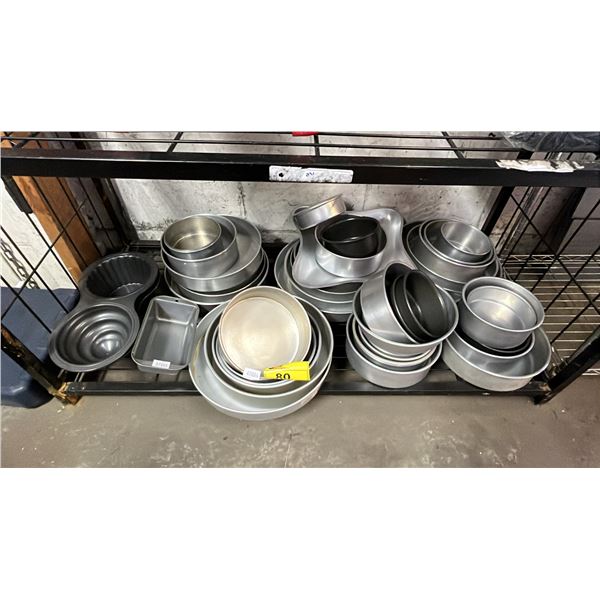 SHELF OF ASSORTED CAKE PANS