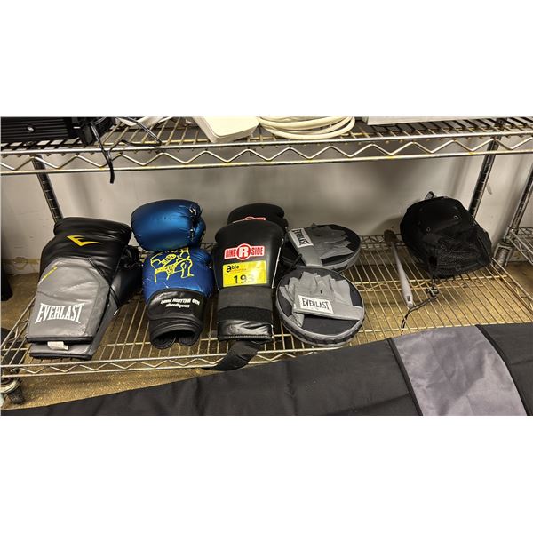 SHELF OF ASSORTED BOXING GLOVES