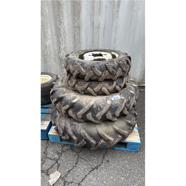 (4) TIGER BRAND TRACTOR TRAILER TIRES MOUNTED ON 6 BOLT METAL RIMS