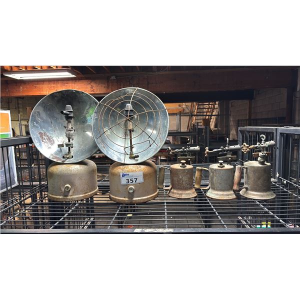 SHELF OF VINTAGE KEROSENE HEATERS & GAS BLOW TORCHES