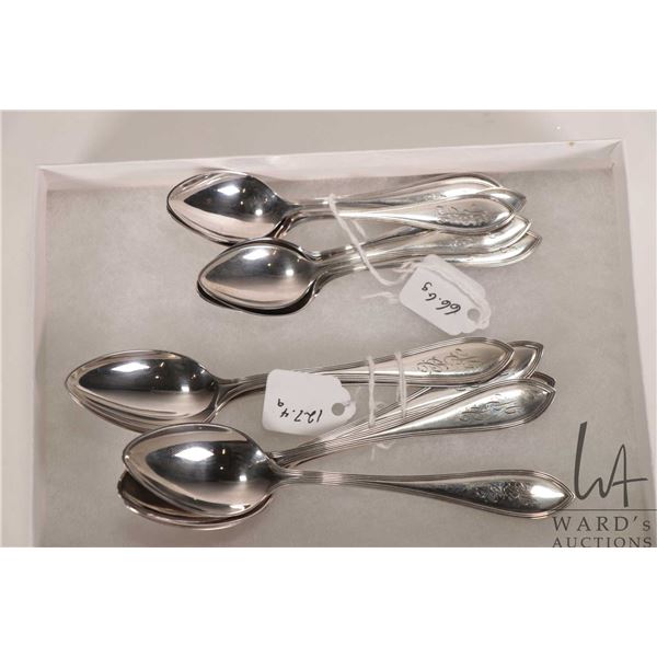 Twelve matching sterling silver spoons including 6 tea spoons and 6 coffee spoons, marked MBC, and i