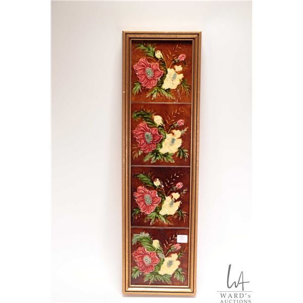 Framed set of four antique Arts & Crafts glazed floral tiles, overall dimensions 24 3/4" X 7"