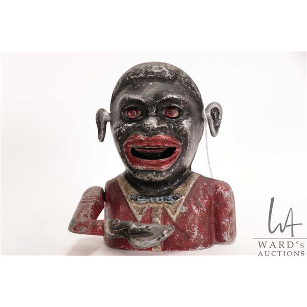 Antique black Americana mechanical money bank, 5 1/2" in height