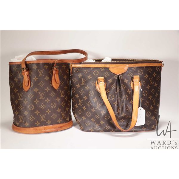 Two vintage Louis Vuitton bags including bucket tote, serial no. 9005 V.I. ( note: liner removed) an