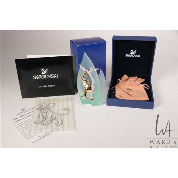 Swarovski gold plated elephant brooch plus a Swarovski magnetic brooch holder and a crystal tattoo