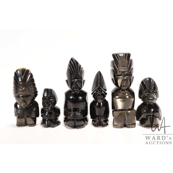 Six black and gold sheen hand carved obsidian Mayan Aztec figurines