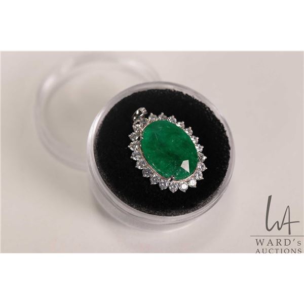 7.10 ct oval cut emerald gemstone set in sterling silver mount with cubic zirconia and certificate p