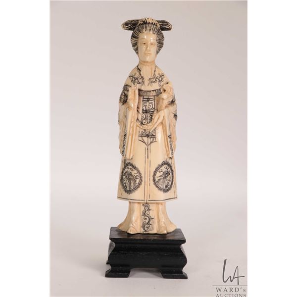 Carved ivory figure of a woman in decorative scrimshaw Imperial dress, 5" in height. Can not be ship
