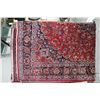 Image 1 : Iranian wool carpet "Mashad" with center medallion on red background with overall floral design and 