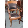 Image 1 : Antique open arm quarter cut oak side chair with leather upholstered seat and back and carved paw fe