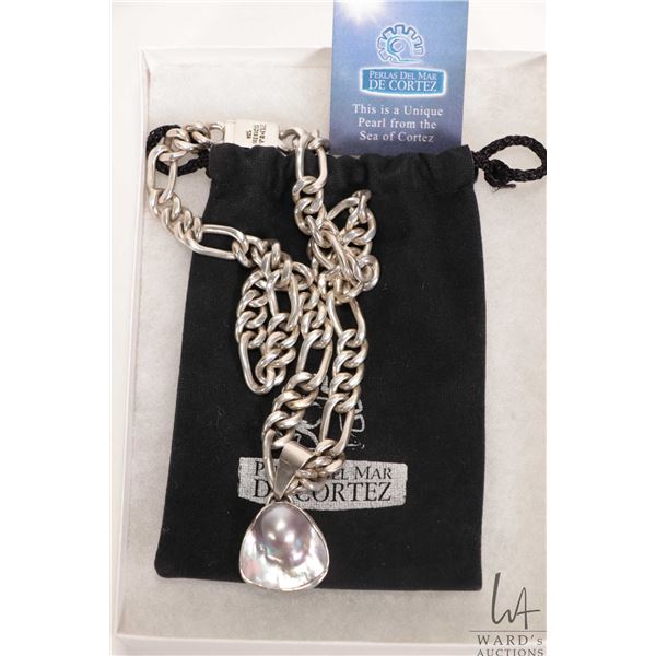 Sea of Cortez pearl pendant in unmarked silver holder and a heavy 20" silver necklace marked 925 Mex