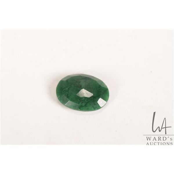 12.10 ct. Columbian emerald oval cut gemstone with certificate provided by consignor