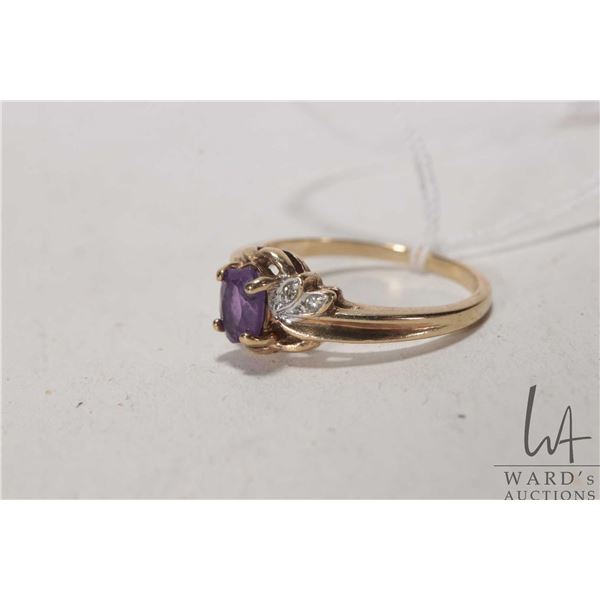 10kt yellow gold ring set with amethyst gemstone and diamond accents, size 5.5