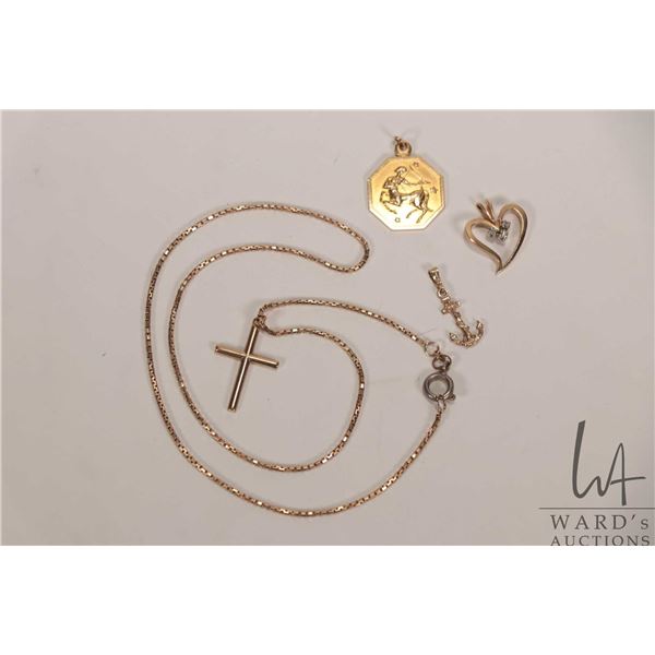 10kt yellow gold 16" box chain, note: replaced clasp and four gold pendants including 9ct gold cross