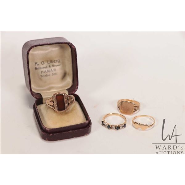 Antique rose gold ring set with center stone, note: split in shank, plus three 10kt gold rings, all 