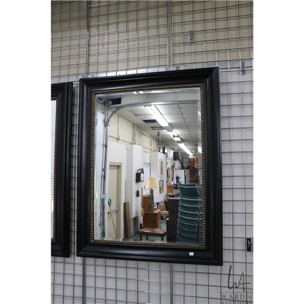 Large wood framed beveled glass mirror, overall dimensions 48" X 38"