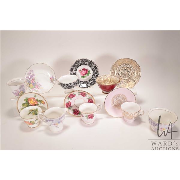 Selection of china tea ware including six cups and saucer, and a milk jug and sugar bowl including C