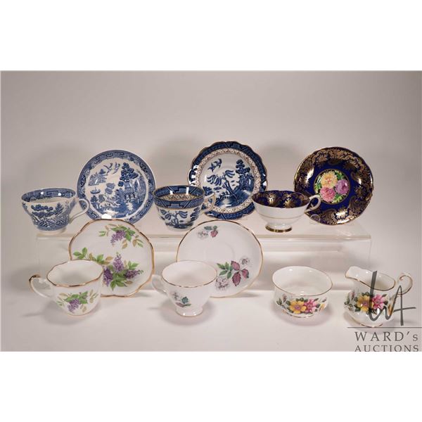 Selection of china tea ware including five cups and saucer plus a milk jug and sugar bowl, Paragon, 