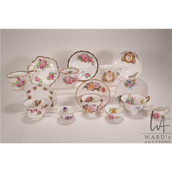 Selection of china teaware including six cups and saucers , small cream and two sugars, including De