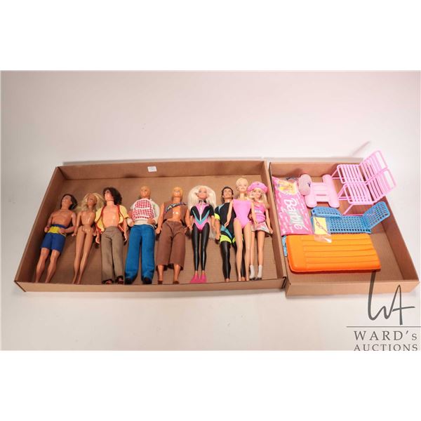 Selection of vintage Mattel Barbie dolls including Malibu Barbie and Ken, Seaworld Barbie and Ken an