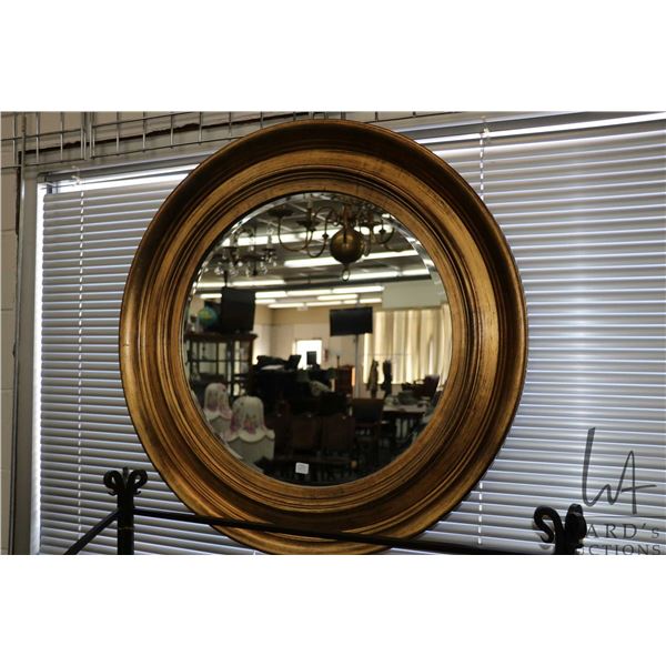 Modern gilt framed beveled wall mirror 34" outside diameter