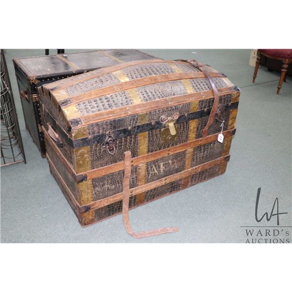Antique oak and leather bound metal wrapped dome top steamer trunk, note: part of leather strap is i