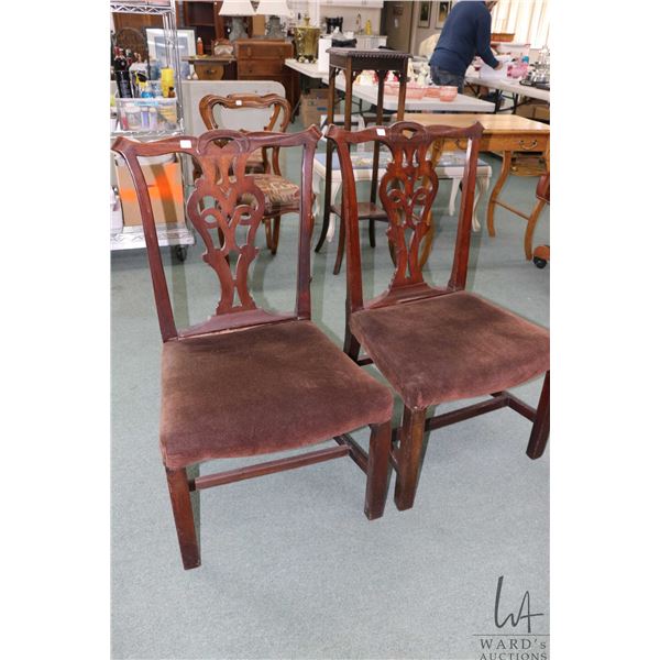 Pair of antique side chairs with fretwood backs and upholstered seats