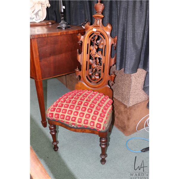Antique Victorian Rococo revival walnut side chair with grape and leaf carved back and upholstered s