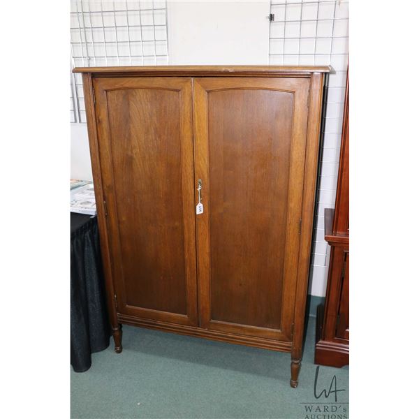Antique two door fitted chiffarobe with wardrobe section and four drawers, 57" H X 40" W X 24" D