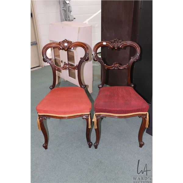Pair of matching antique Victorian balloon back chairs with scroll supports, carved backs and uphols