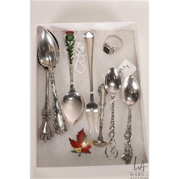 Selection of sterling silver including collector spoons, tea spoons, small ladle, pickle fork, gents