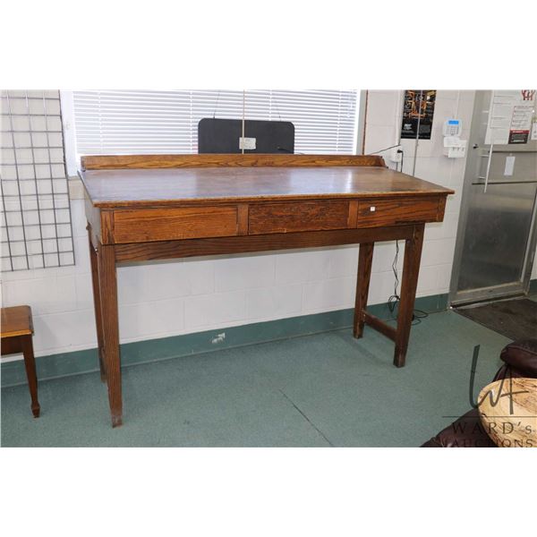 Antique Mission style, three drawer oak clerks/ standing desk, 49" H X 72" W X 27" D