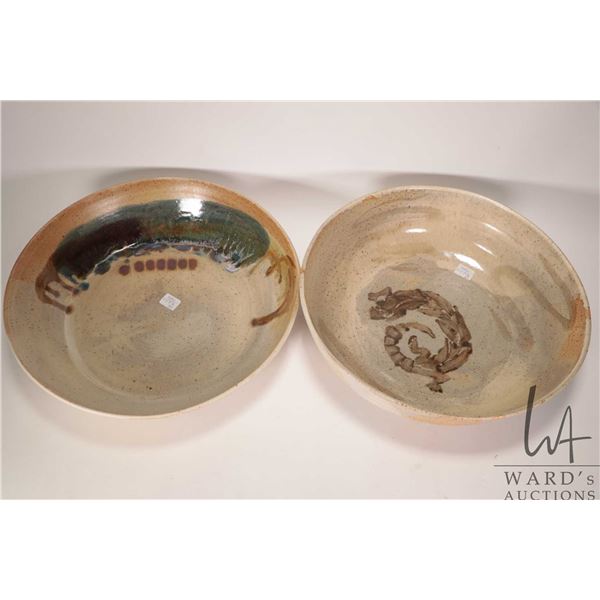 Two artisan made pottery bowls including 14 3/4"" and 14" diameter by L. Kosteriva ( Creech' s Lakel