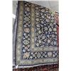 Image 1 : Iranian wool carpet "Kashan" with center medallion on blue background with overall floral design and