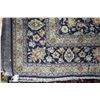 Image 2 : Iranian wool carpet "Kashan" with center medallion on blue background with overall floral design and