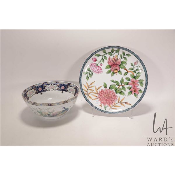 Two pieces of Japanese porcelain including 12" floral motif charger and a 10" diameter Imari peacock