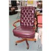 Image 1 : Quality tufted oxblood leather swivel office chair with wooden goose neck arms and five castor base