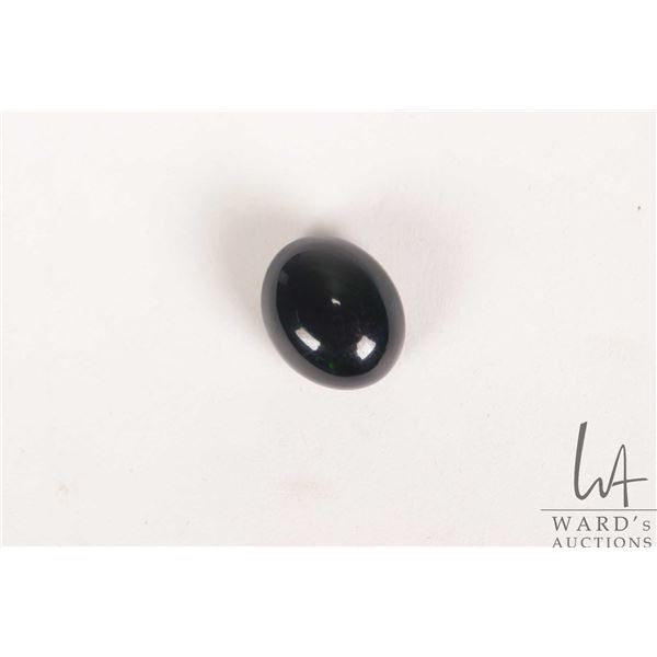 13.43 ct. black Welo opal cabochon cut gemstone with certificate provided by consignor