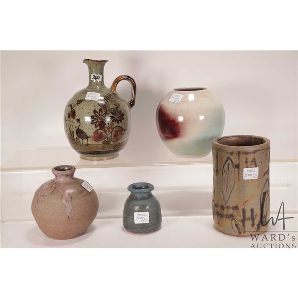 Five pottery vessels including 8" ewer/ pitcher, cylinder vase etc.