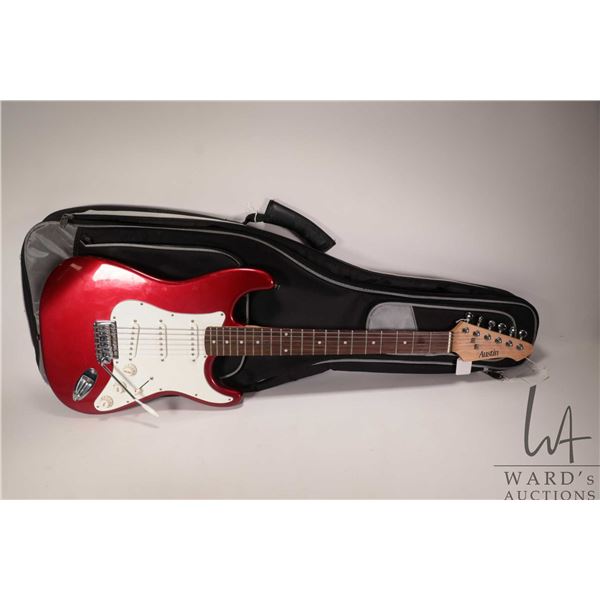 Austin Stratocastor six string electric guitar with back pack style soft case