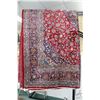 Image 1 : Iranian wool carpet "Mashad" with center medallion on red background, overall floral design and high