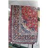 Image 1 : Iranian wool carpet "Esfahan" with center medallion, red background, overall floral design and highl
