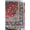 Image 1 : Iranian wool carpet "Esfahan" with center medallion, red background and highlights of blues, cream a