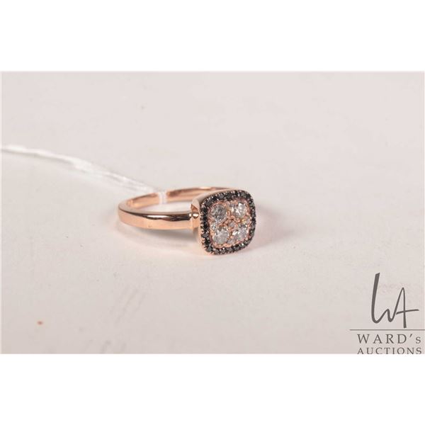 14kt rose gold and diamond ring set with .46ct of natural diamonds. Retail replacement value $2,200.