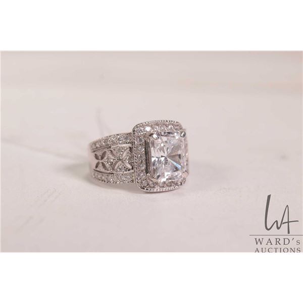 14kt white gold ring set with cubic zirconia 5.7 grams, size 6.75