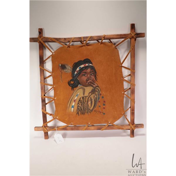 Ken Wykes, stretcher framed acrylic on buck skin painting of an Indigenous child, dated '79, overall