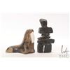 Image 1 : Two Inuit soapstones including 5 1/2" Inukshuk and a walrus signed by artist Thorn 3 3/4" in height