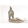 Image 3 : Komek ( Annie Komek Kigiuna?) signed hand carved soapstone hunter with two seals, 6 1/2" in height